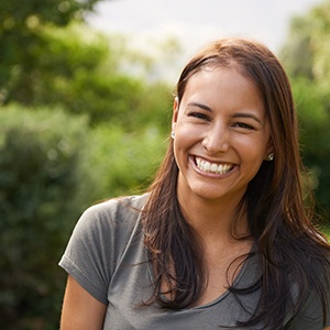 smiling woman in a natural setting