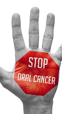 hand with the words Stop Oral Cancer on it