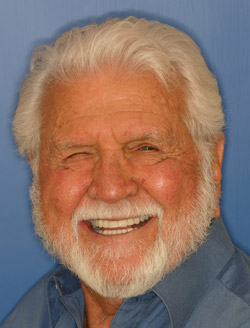 Smiling senior man with dental implants in North Dallas