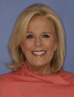 Woman smiling after getting tooth colored fillings in North Dallas