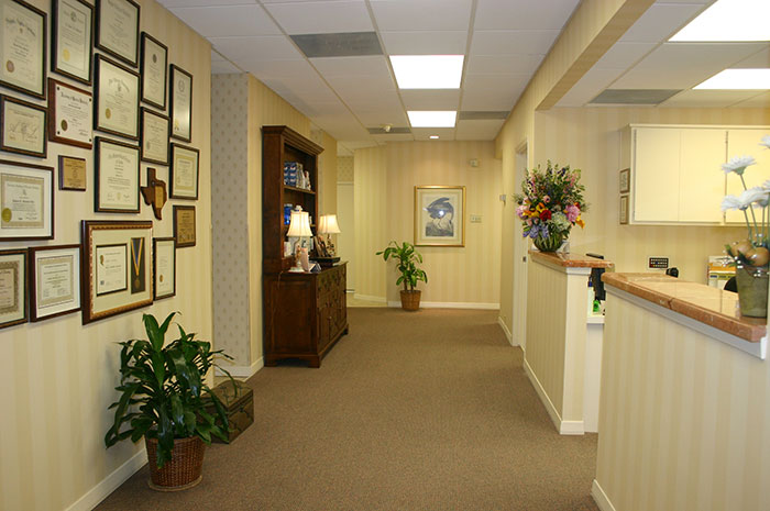 Hallway with yellow striped walls