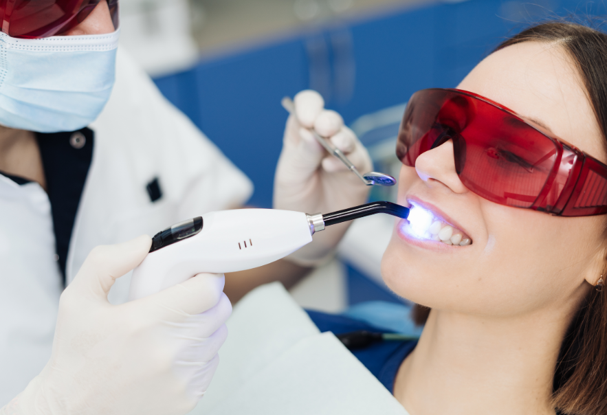 Patient undergoing teeth whitening